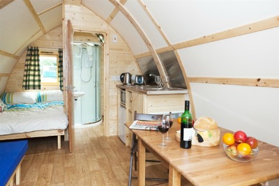 wooden tent with ensuite shower and toilet